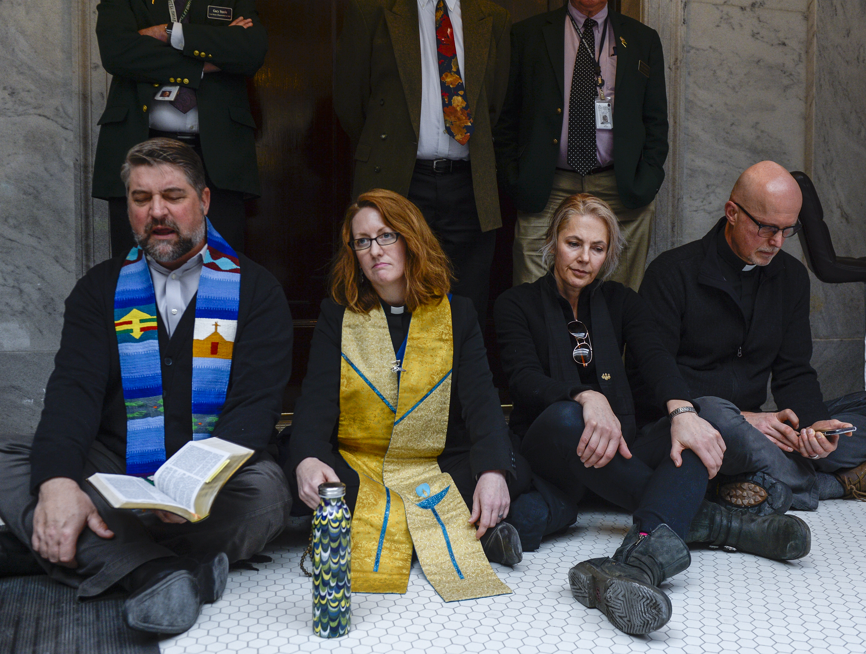 Leah Hogsten | The Salt Lake Tribune Faith leaders l-r Rev. Curtis Price with The First Baptist Church of Salt Lake City, Rev. Monica Dobbins with the First Unitarian Church of Salt Lake City, Zen Buddhist Anna Zumwalt and Pastor David Nichols with Mt. Tabor Lutheran Church demonstrate in opposition to SB96 outside the Utah House chambers, Feb. 8, 2019. 