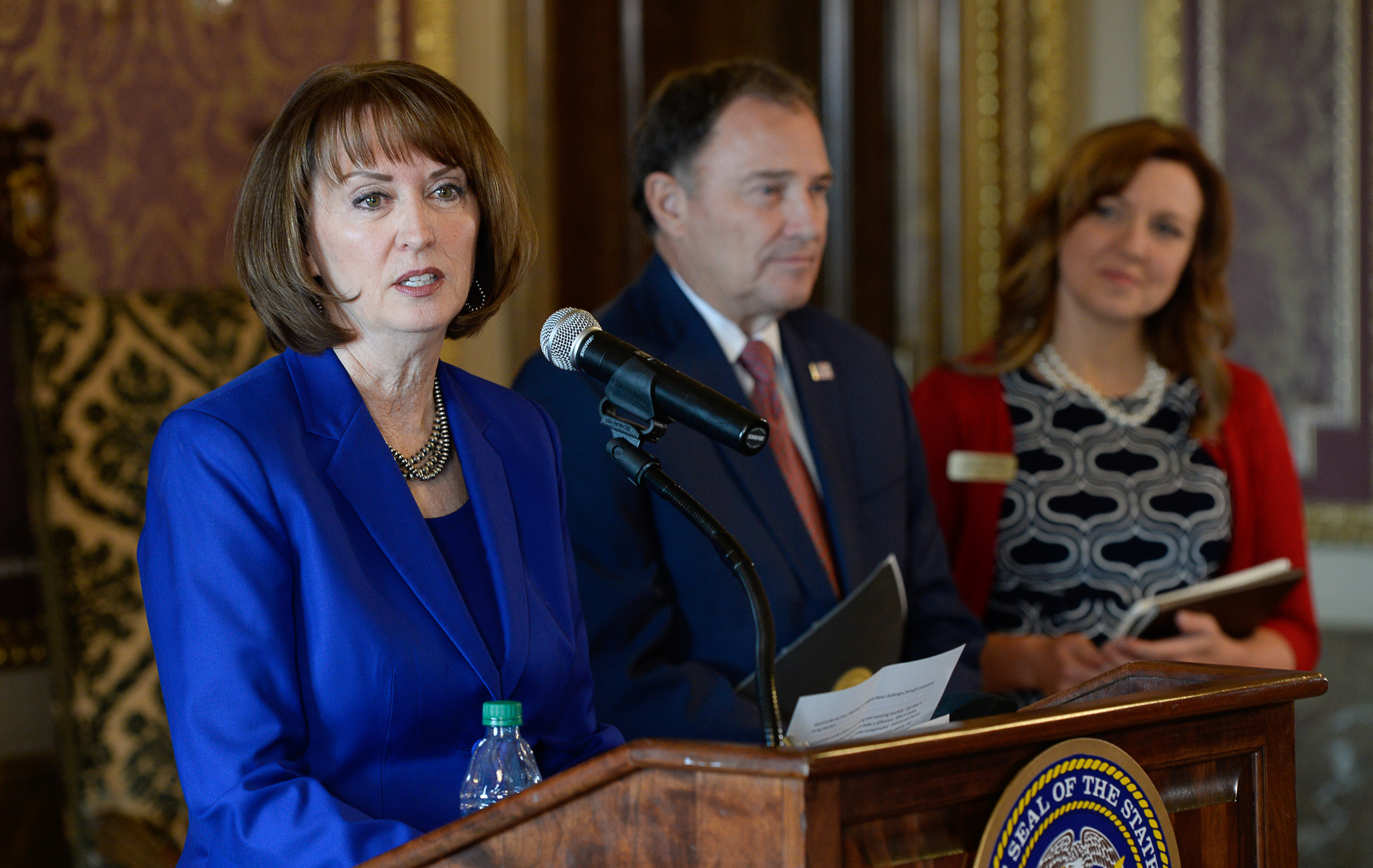 (Francisco Kjolseth | The Salt Lake Tribune) Sydnee Dickson, State Superintendent of Public Instruction is joined by Governor Gary Herbert and Aaryn Birchell, 2017-2018 Utah Teacher of the Year as education leaders discuss UtahÕs teacher shortage and issue a call for more teachers during a press event at the Utah Capitol on Wed. Sept. 12, 2018. 
