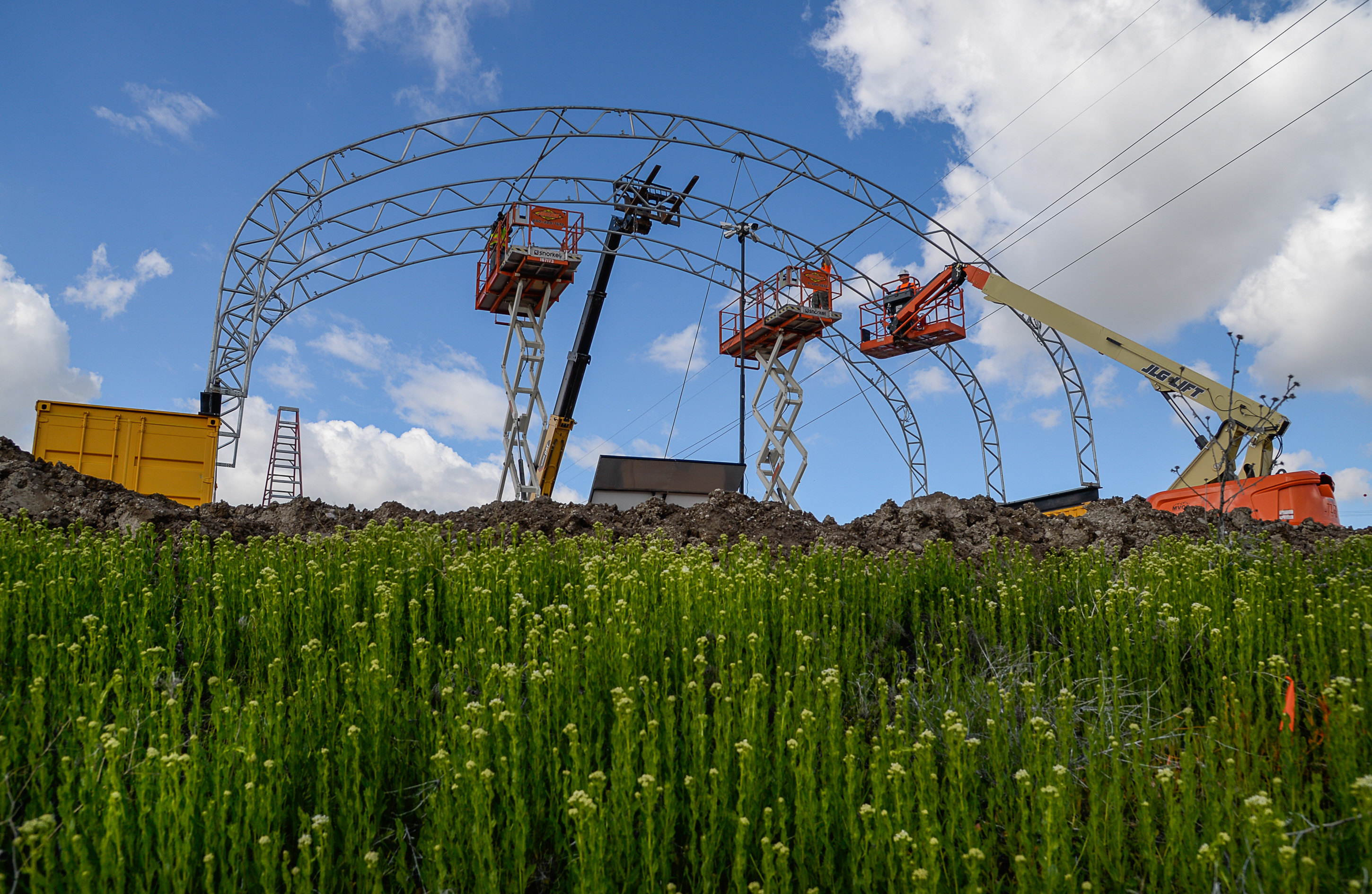 (Francisco Kjolseth | The Salt Lake Tribune) Crews begin building a storage facility near 5600 West and the S.R. 201 as part of the Utah Department of Transportation's top construction project which will link the Mountain View Corridor from 4100 South to S.R. 201. The $335 million four-mile project, includes four lanes (two in each direction) and 13 new bridges.