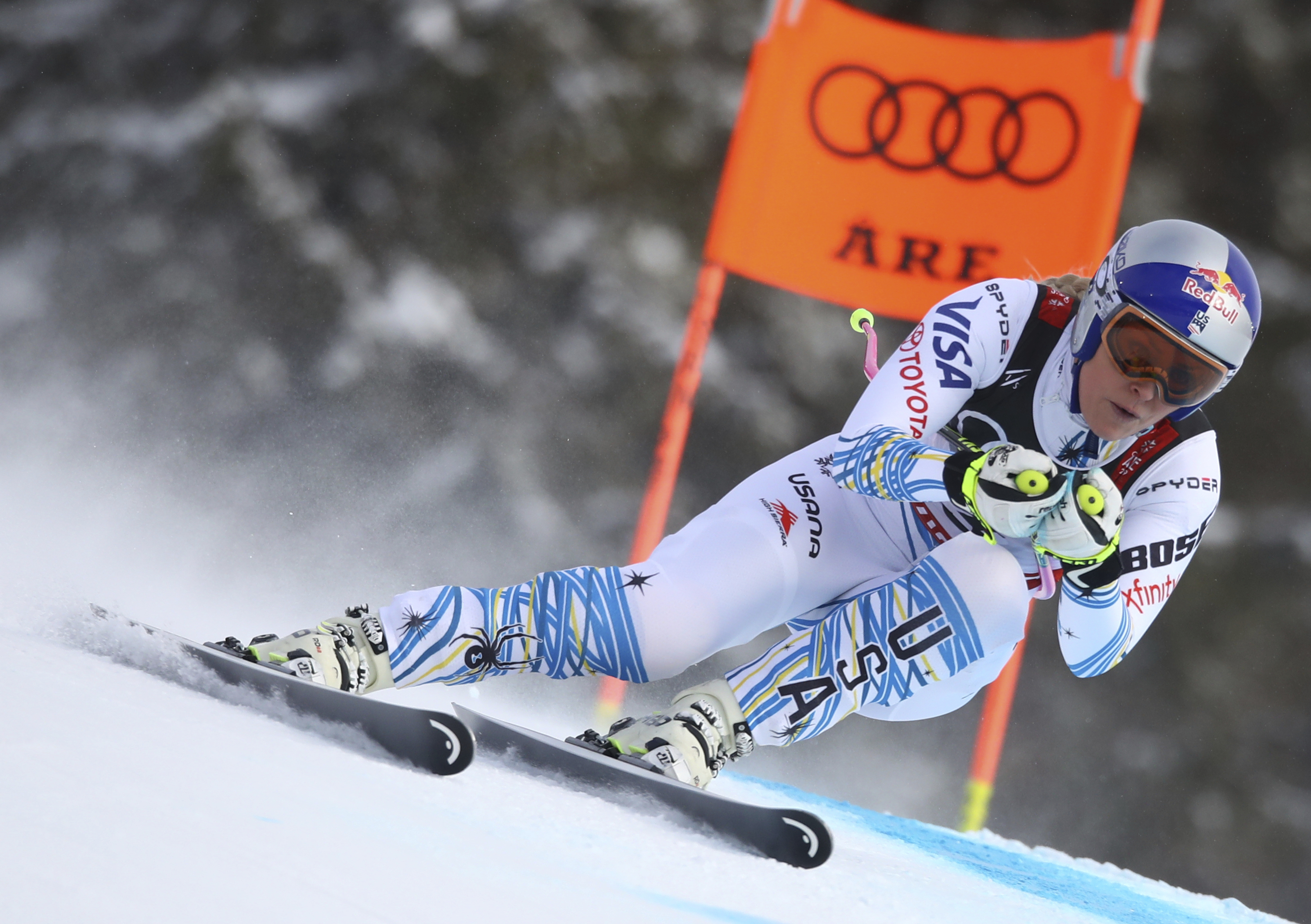 Lindsey Vonn speeds down the course during the women's downhill race, at the alpine ski World Championships in Are, Sweden, Sunday, Feb. 10, 2019. (AP Photo/Alessandro Trovati)