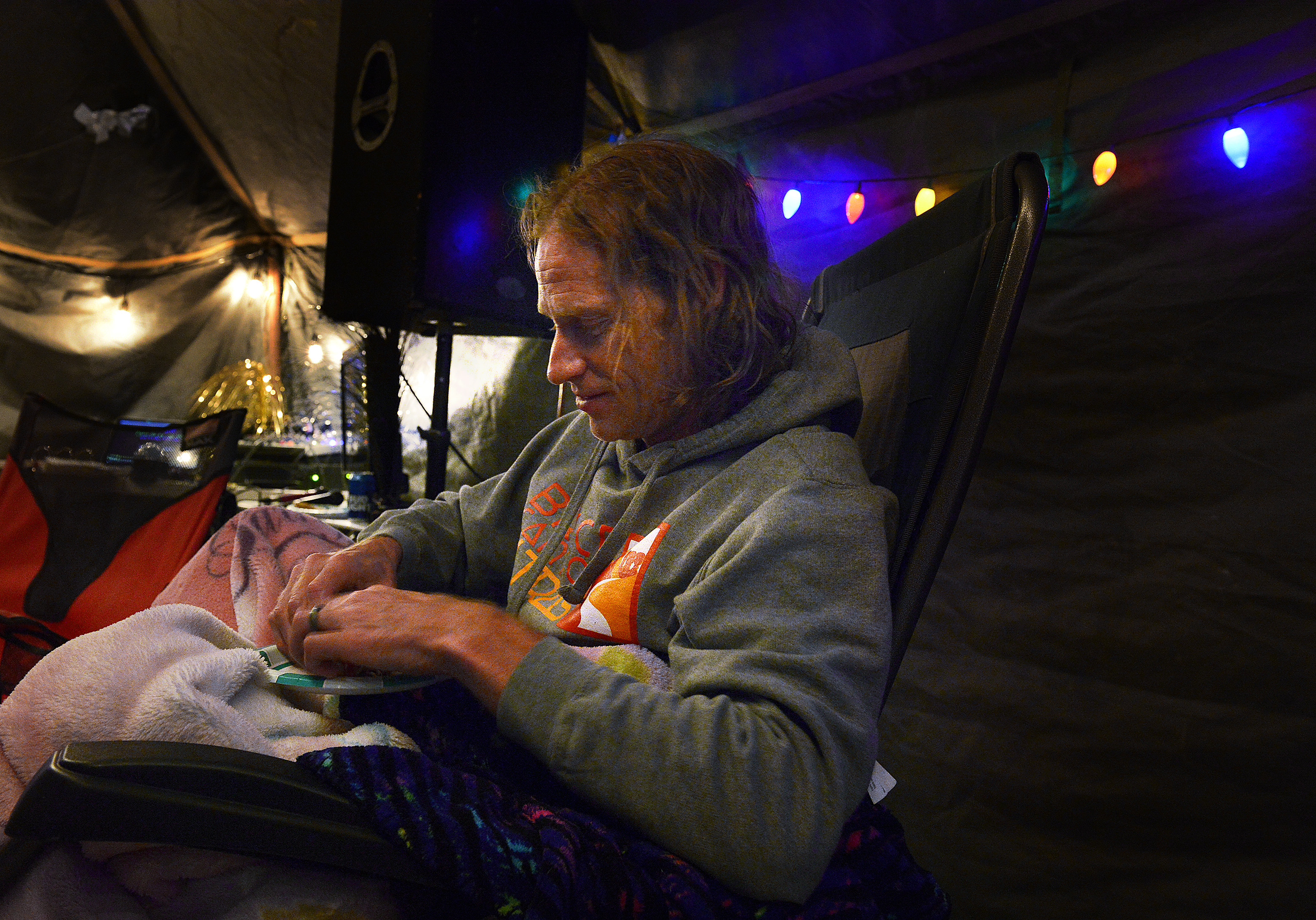(Scott Sommerdorf | The Salt Lake Tribune) Matt Van Horn, the winner of the Salt Flats 100 Endurance Run wakes up to eat a small meal in Aid Station 14, Saturday, May 5, 2018. Van Horn finished the race at around 1 a.m., and was so full of energy, he immediately sang a round of karaoke with volunteers at the checkpoint. 