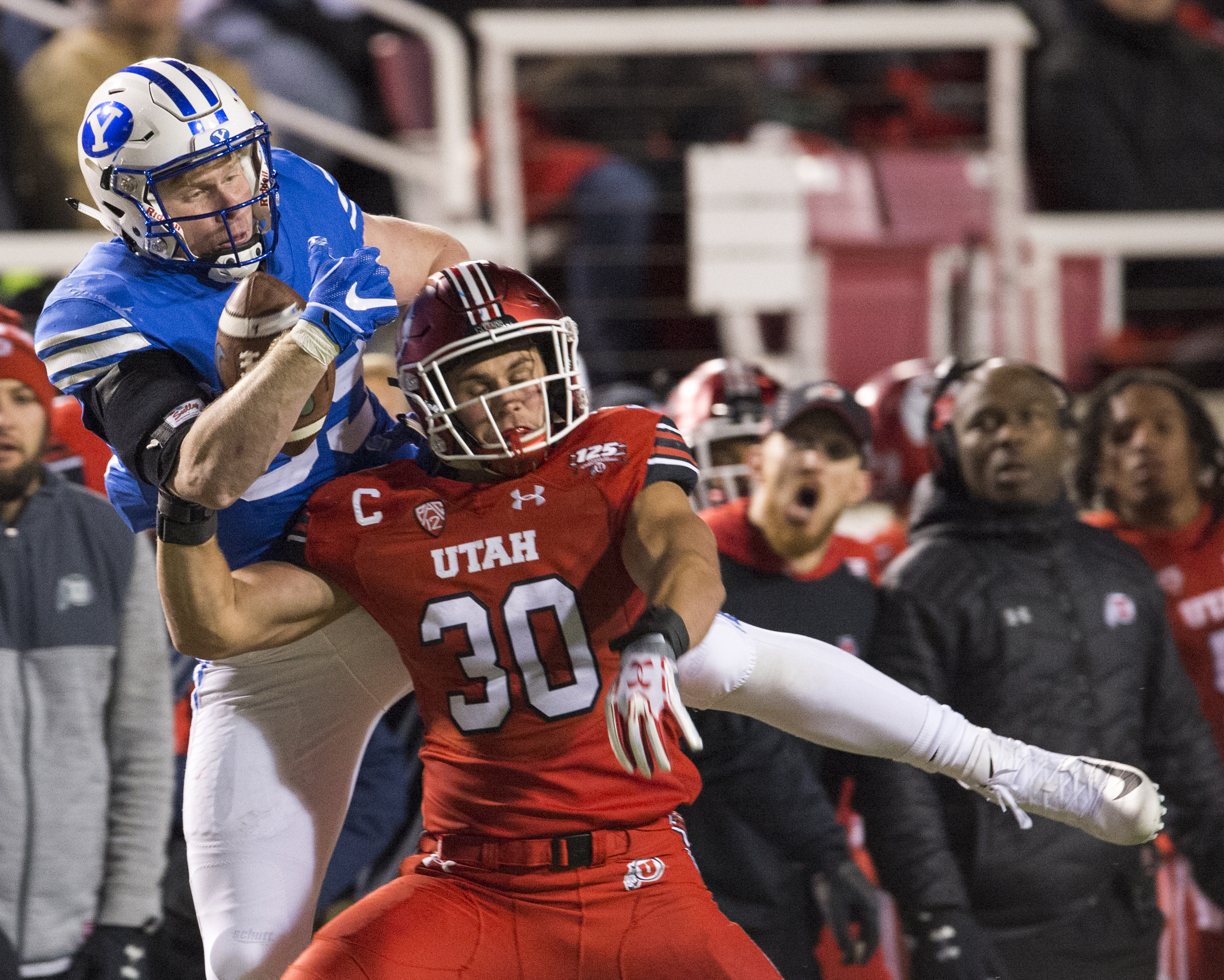 (Rick Egan | The Salt Lake Tribune) Brigham Young Cougars tight end Matt Bushman (89) grabs a one handed pass, as Utah Utes linebacker Cody Barton (30) defends, in football action between the Brigham Young Cougars and the Utah Utes, at Rice-Eccles Stadium, Saturday, November 24, 2018. 