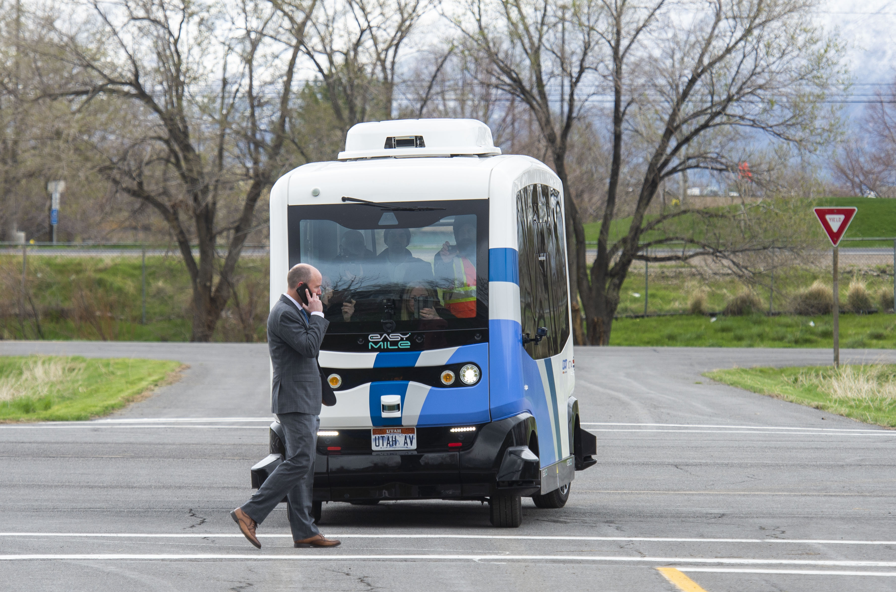 (Rick Egan | The Salt Lake Tribune) Lt. Governor Spencer J. Cox walks in front of an Autonomous Shuttle, to see if it will stop for him, during a demonstration as the Utah Department of Transportation, in partnership with the Utah Transit Authority, launched a new Autonomous Shuttle Pilot Project at the test track is across the street from UDOT headquarters on the west side of 2700 West. Thursday, April 11, 2019. 