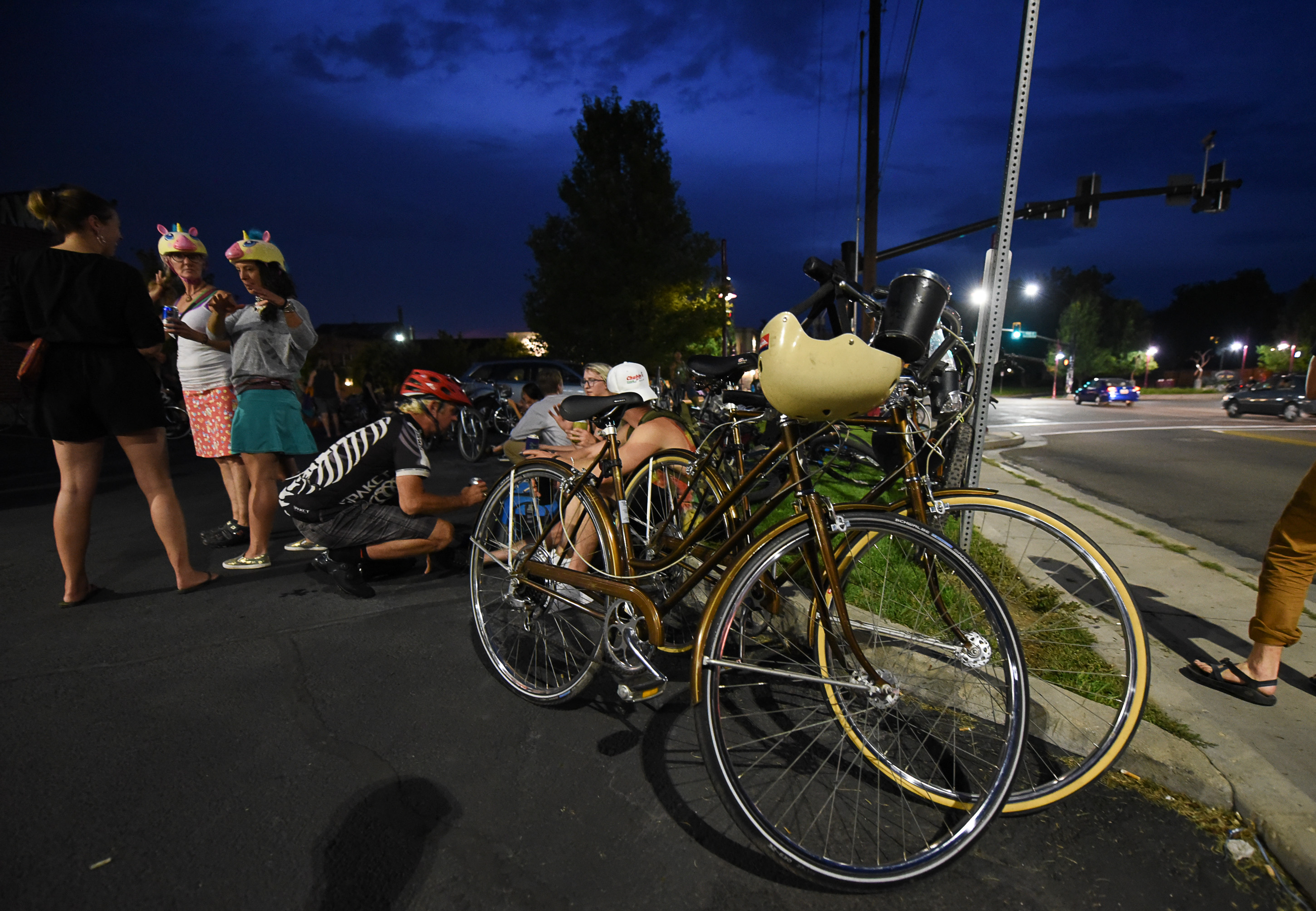(Francisco Kjolseth | The Salt Lake Tribune) A large group of cyclist gathers on the corner of 9th and 9th at 9pm in Salt Lake City on Thursday, July 26, 2018, for the weekly ride that has become known as the 999 Ride. The inclusive, all-welcoming slow casual social ride happens year round on Thursday nights, with riders often pedaling into the early morning hours. Newly released video shows rider Cameron Hooyer being struck and killed by a FrontRunner train at a downtown railroad crossing during last weeks ride when the 22-year-old failed to stop or heed the warning signals before crossing the tracks during the group ride. 