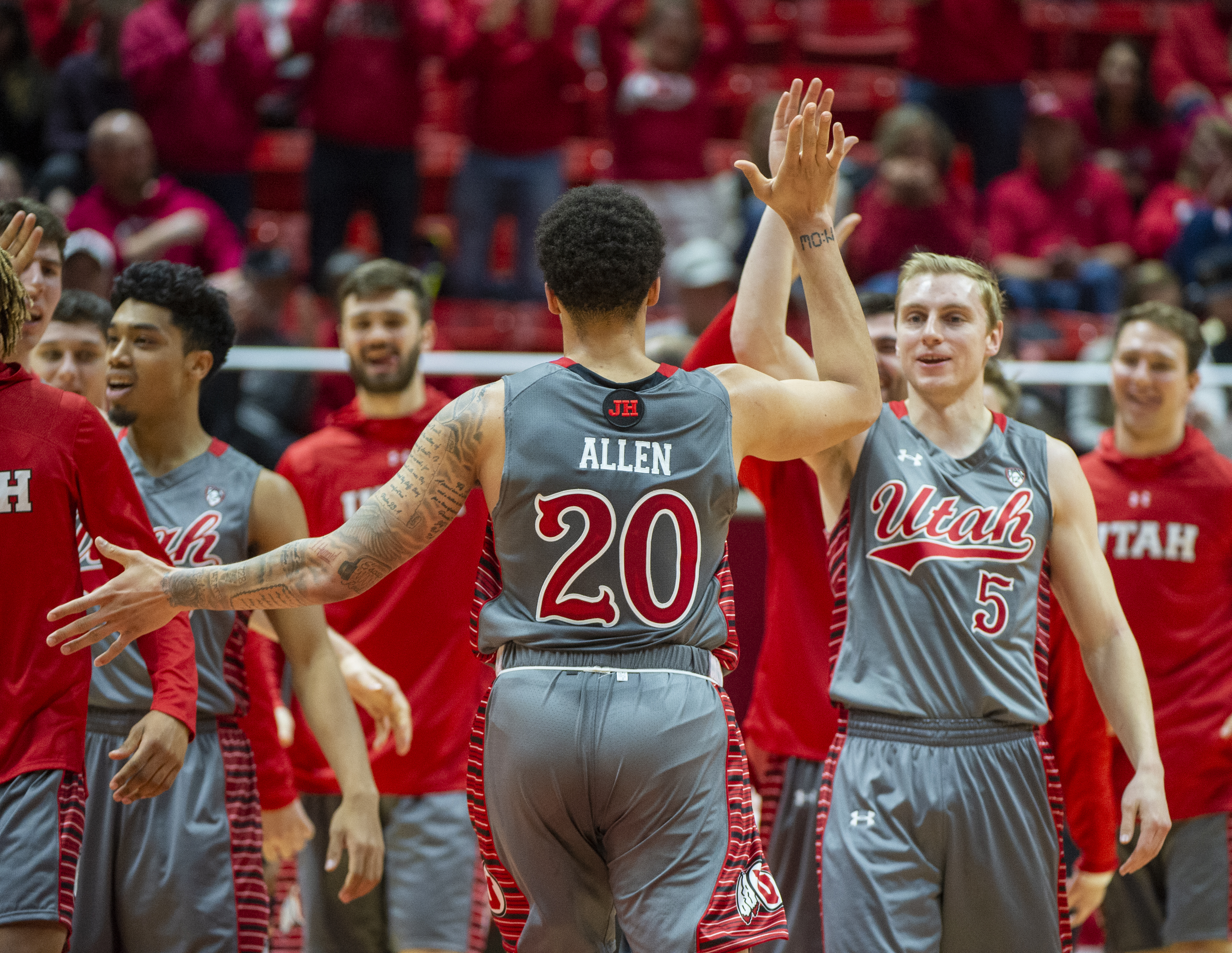 (Rick Egan | The Salt Lake Tribune) Utah Utes forward Timmy Allen (20) celebrates after the Utes jump out to a double digit lead early in the game, on back to back dunks, in PAC-12 basketball action between the Utah Utes and the Colorado Buffaloes at the Jon M. Huntsman Center, Sunday, Jan. 20, 2019. 