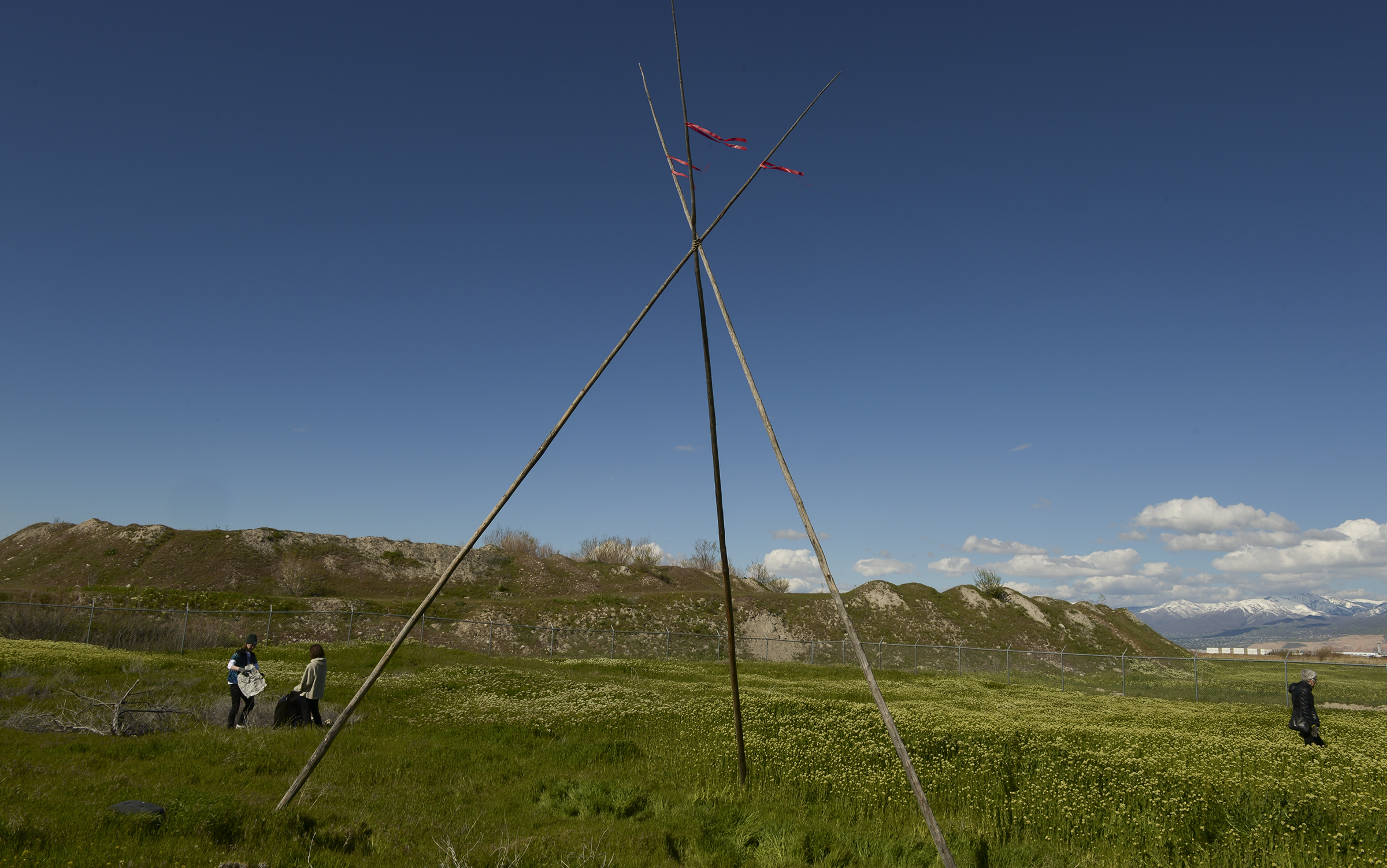 Leah Hogsten | The Salt Lake Tribune The "Stop the Polluting Port" community coalition staged a May Day celebration, calling for respect and awareness of the water, earth and air regarding the 20,000 acres west of Salt Lake City where the inland port industrial site has been proposed. After the ceremony, those in attendance went into the field to pick up trash at the site at 7200 West and I-80.