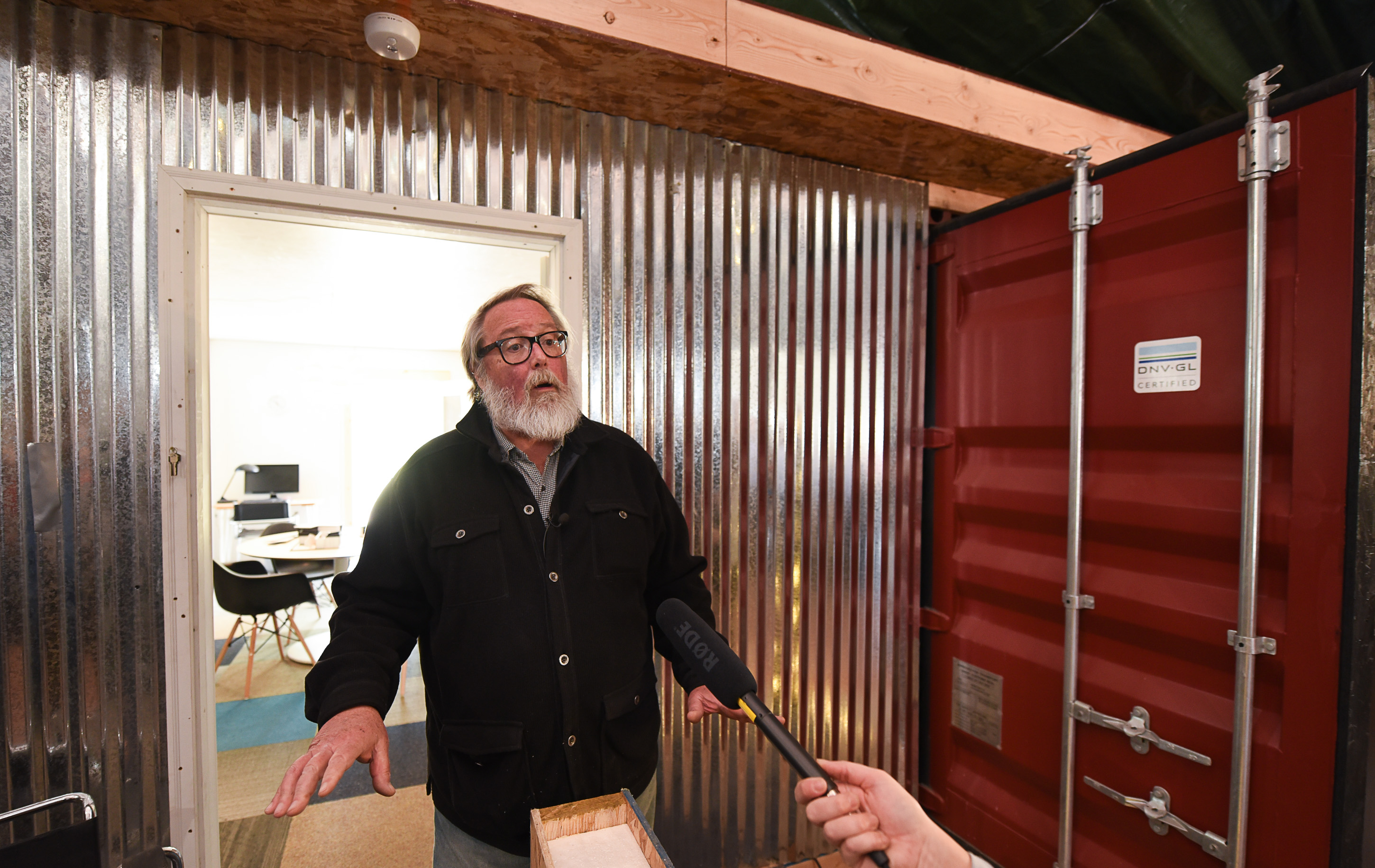 (Francisco Kjolseth | The Salt Lake Tribune) Small house specialist Jeff White, pairs up with Our Homes, Our Voices, a campaign to bring more attention to the affordable housing crisis across the country as he showcases a 432 square foot experimental home he built inside a warehouse in Salt Lake that would cost about $36,000 and be easy to assemble on a lot.