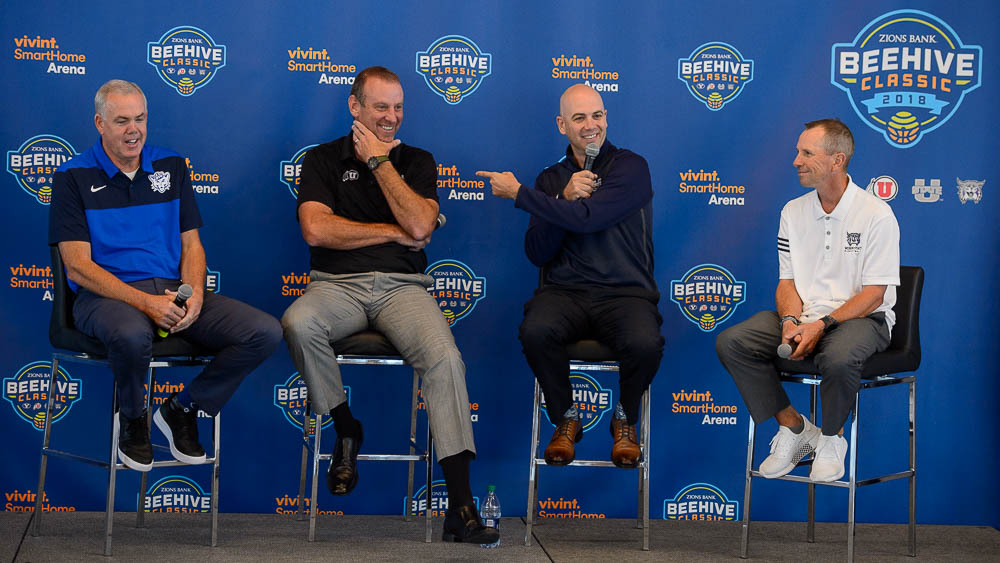 (Trent Nelson | The Salt Lake Tribune) The four college basketball coaches competing in the Beehive Classic speak at a news conference at Vivint Smart Home Arena in Salt Lake City on Tuesday Aug. 21, 2018. Dave Rose (BYU), Larry Krystkowiak (Utah), Craig Smith (Utah State), and Randy Rahe (Weber State).