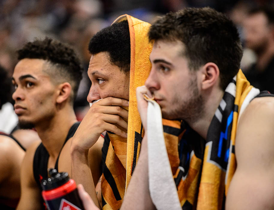 (Trent Nelson | The Salt Lake Tribune) Northeastern Huskies guard Myles Franklin (13), Northeastern Huskies forward Jeremy Miller (11), and Northeastern Huskies guard Vasa Pusica (4) on the bench as Kansas holds a double-digit lead over Northeastern in the 2019 NCAA Tournament in Salt Lake City on Thursday March 21, 2019.