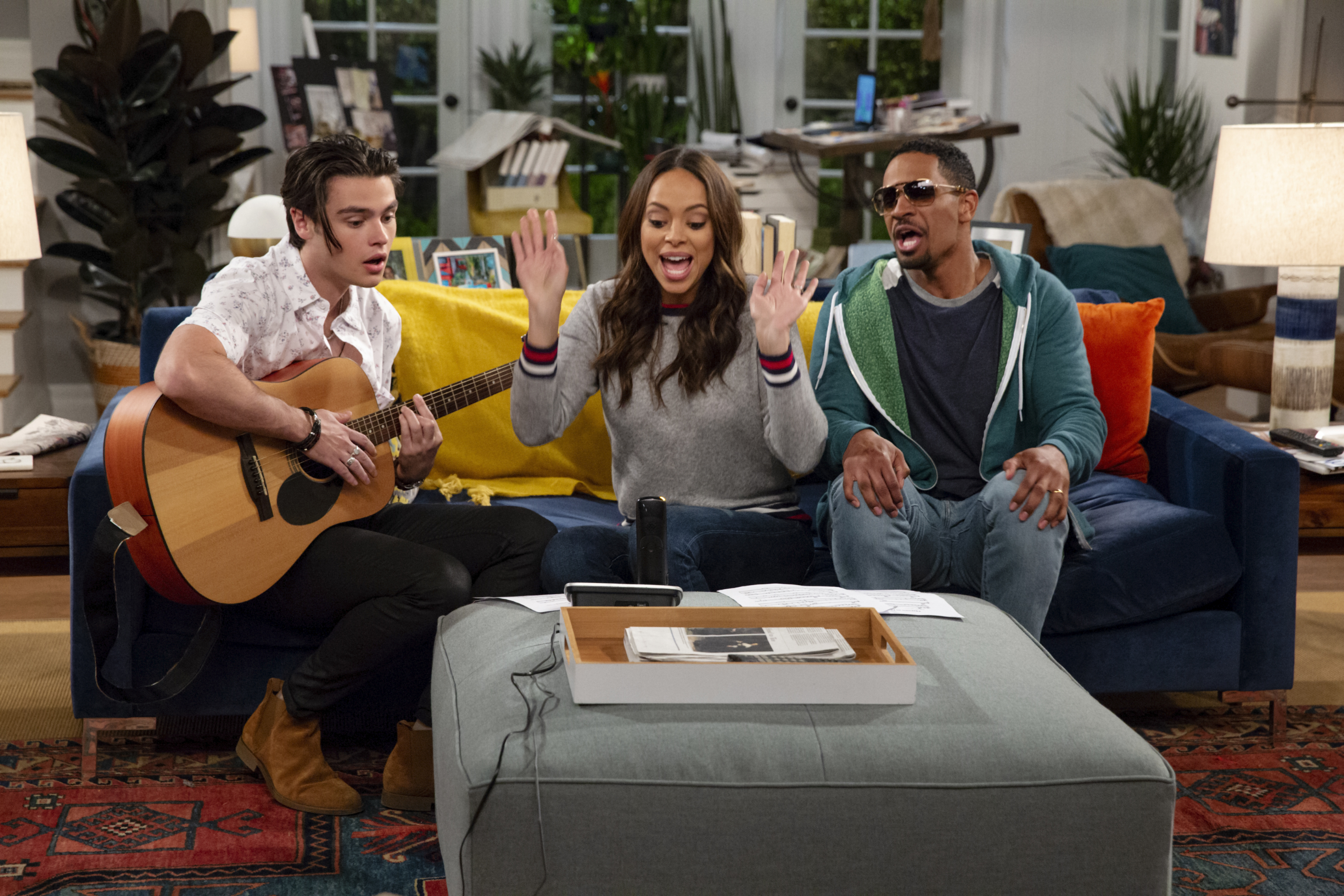 (Photo courtesy Cliff Lipson/CBS) Felix Mallard, Amber Stevens West and Damon Wayans Jr. in “Happy Together.”