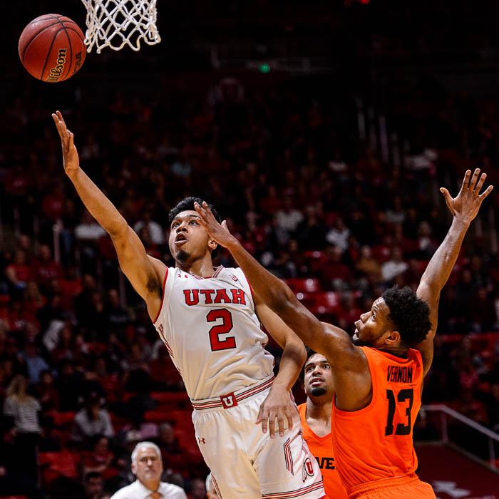 (Trent Nelson | The Salt Lake Tribune) Utah Utes guard Sedrick Barefield (2) shoots with Oregon State Beavers guard Antoine Vernon (13) defending as Utah hosts Oregon State, NCAA basketball in Salt Lake City on Saturday Feb. 2, 2019.