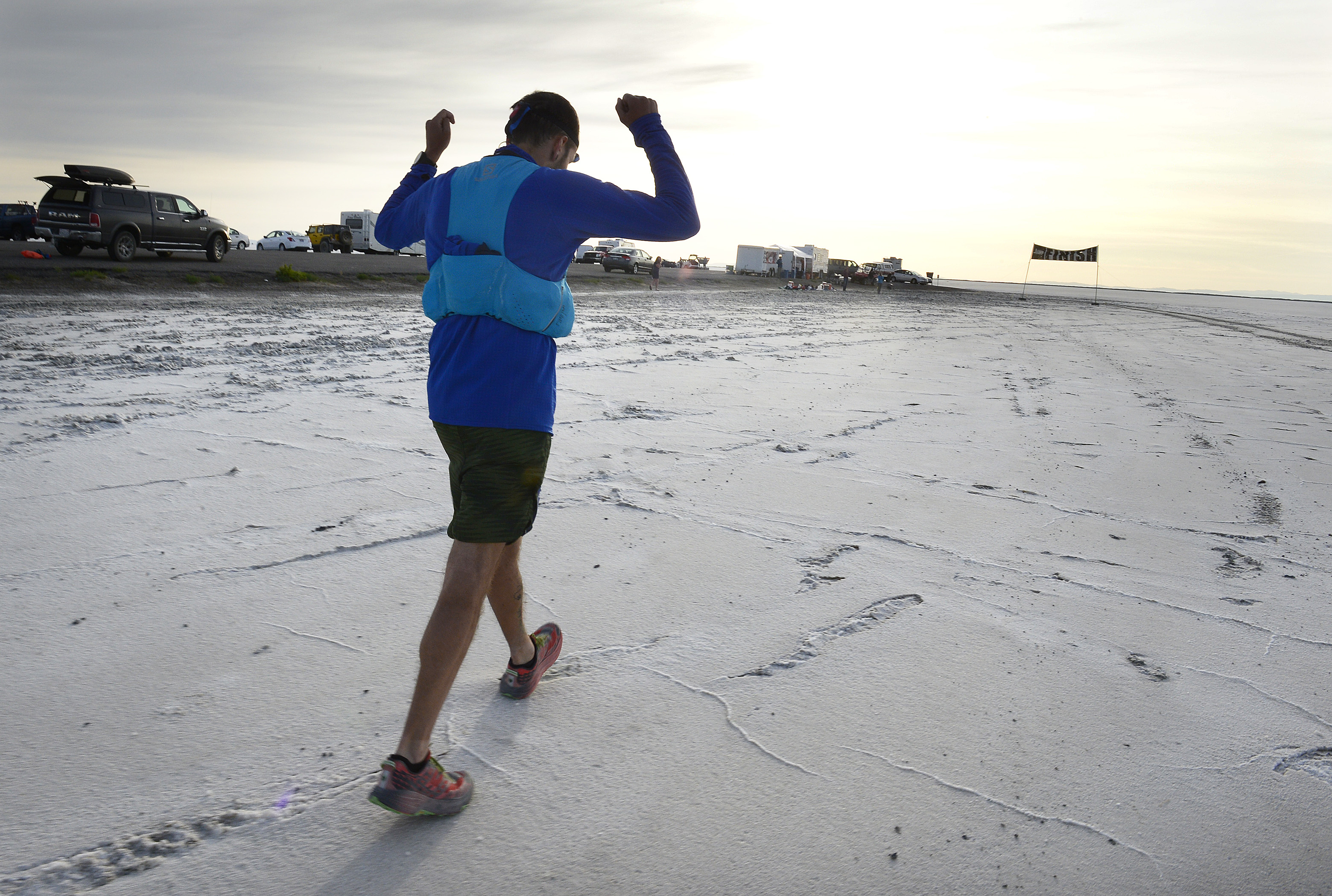 (Scott Sommerdorf | The Salt Lake Tribune) Alex Doolan celebrates as he approaches the finish line the Salt Flats 100 Endurance Run, Saturday, May 5, 2018. Doolan finished in 8th place. 