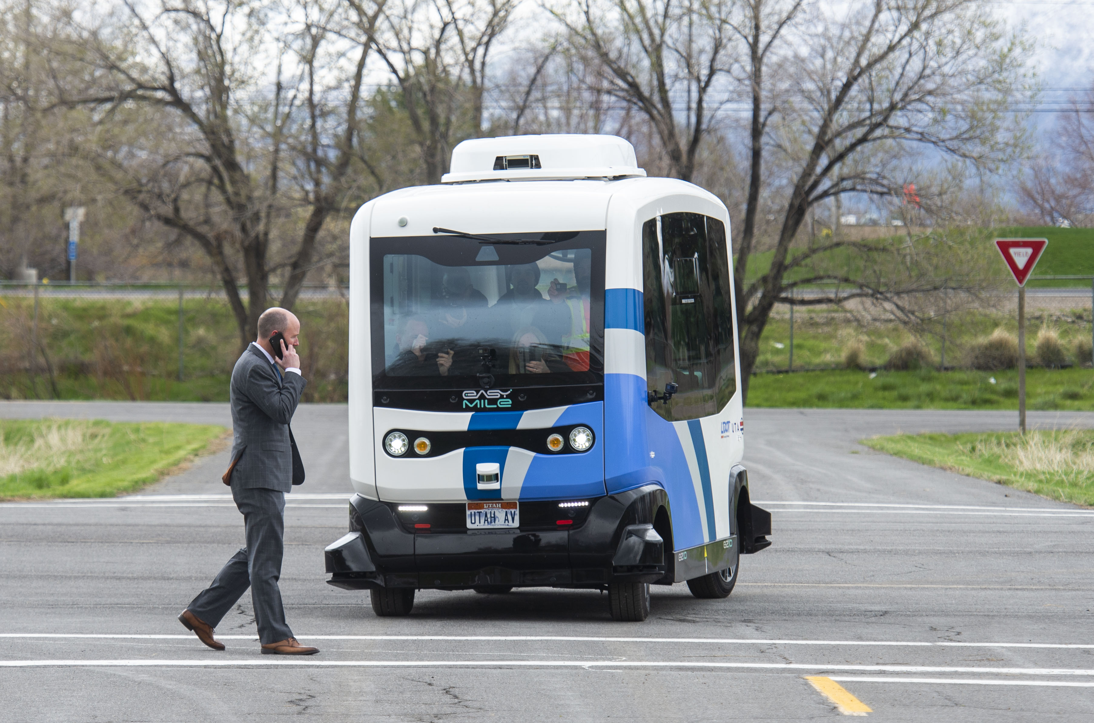 (Rick Egan | The Salt Lake Tribune) Lt. Governor Spencer J. Cox walks in front of an Autonomous Shuttle, to see if it will stop for him, during a demonstration as the Utah Department of Transportation, in partnership with the Utah Transit Authority, launched a new Autonomous Shuttle Pilot Project at the test track is across the street from UDOT headquarters on the west side of 2700 West. Thursday, April 11, 2019. 