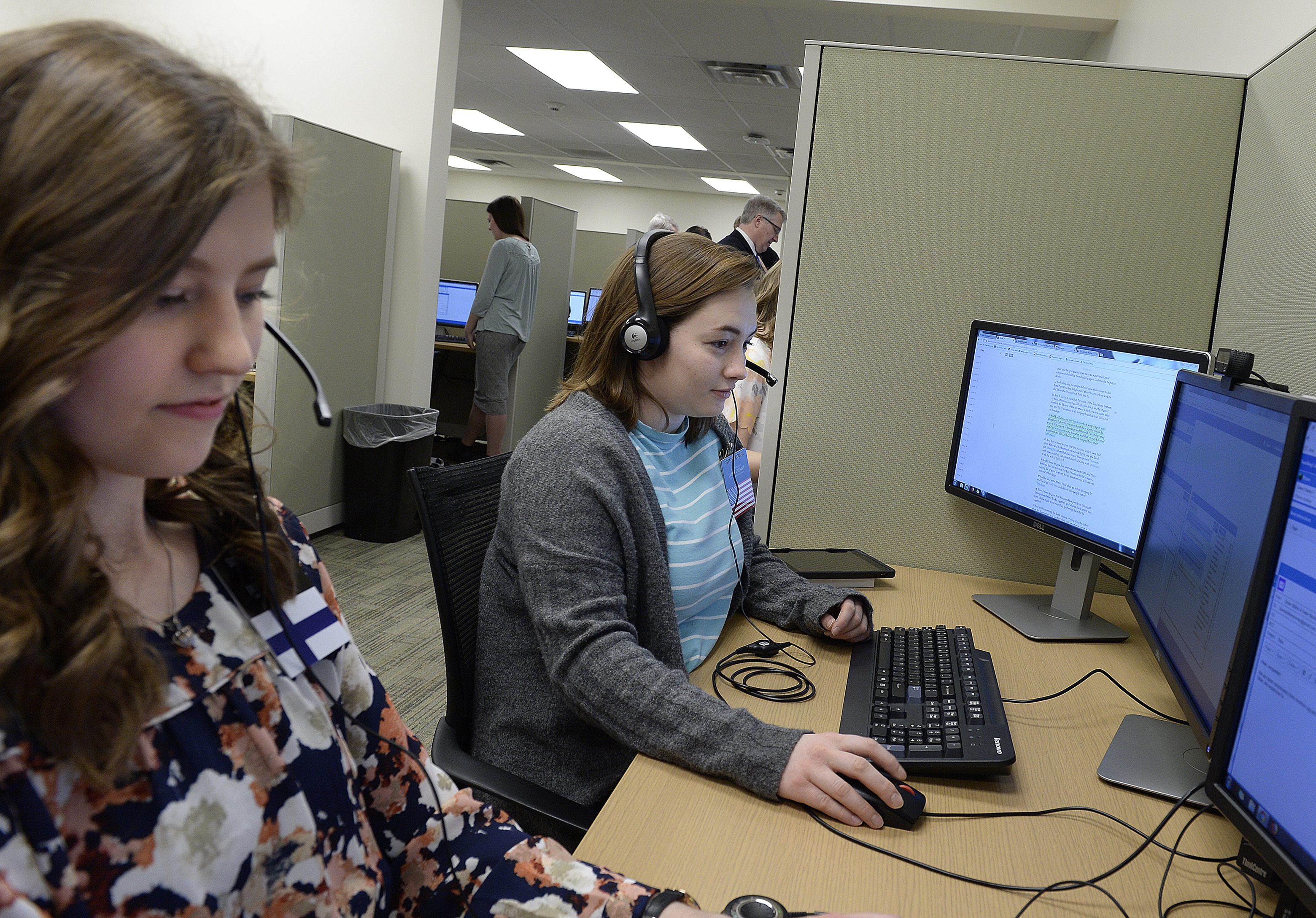 Scott Sommerdorf | The Salt Lake Tribune Sister Eva Stahle, left, from Finland, speaks with a contact asking for more information about the church from the Temple Square North Visitors Center, Thursday, March 8, 2018.