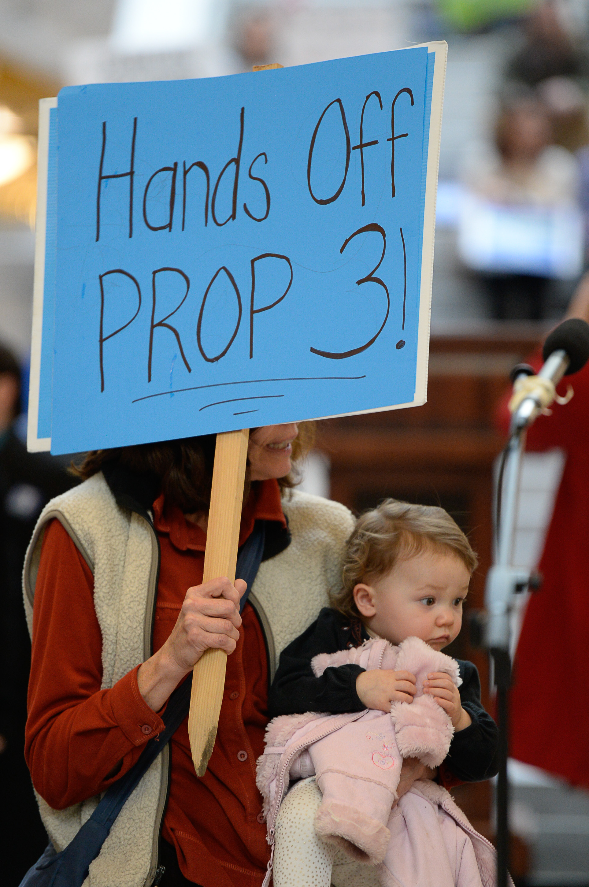 (Francisco Kjolseth | The Salt Lake Tribune) Gaylynn Bennion holds Ashlynn, 20-months, at the Capitol rotunda on Monday, Jan, 28, 2019, on the first day of the Legislative session to rally in support of protecting Proposition 3, the Medicaid Expansion law recently passed by voters.