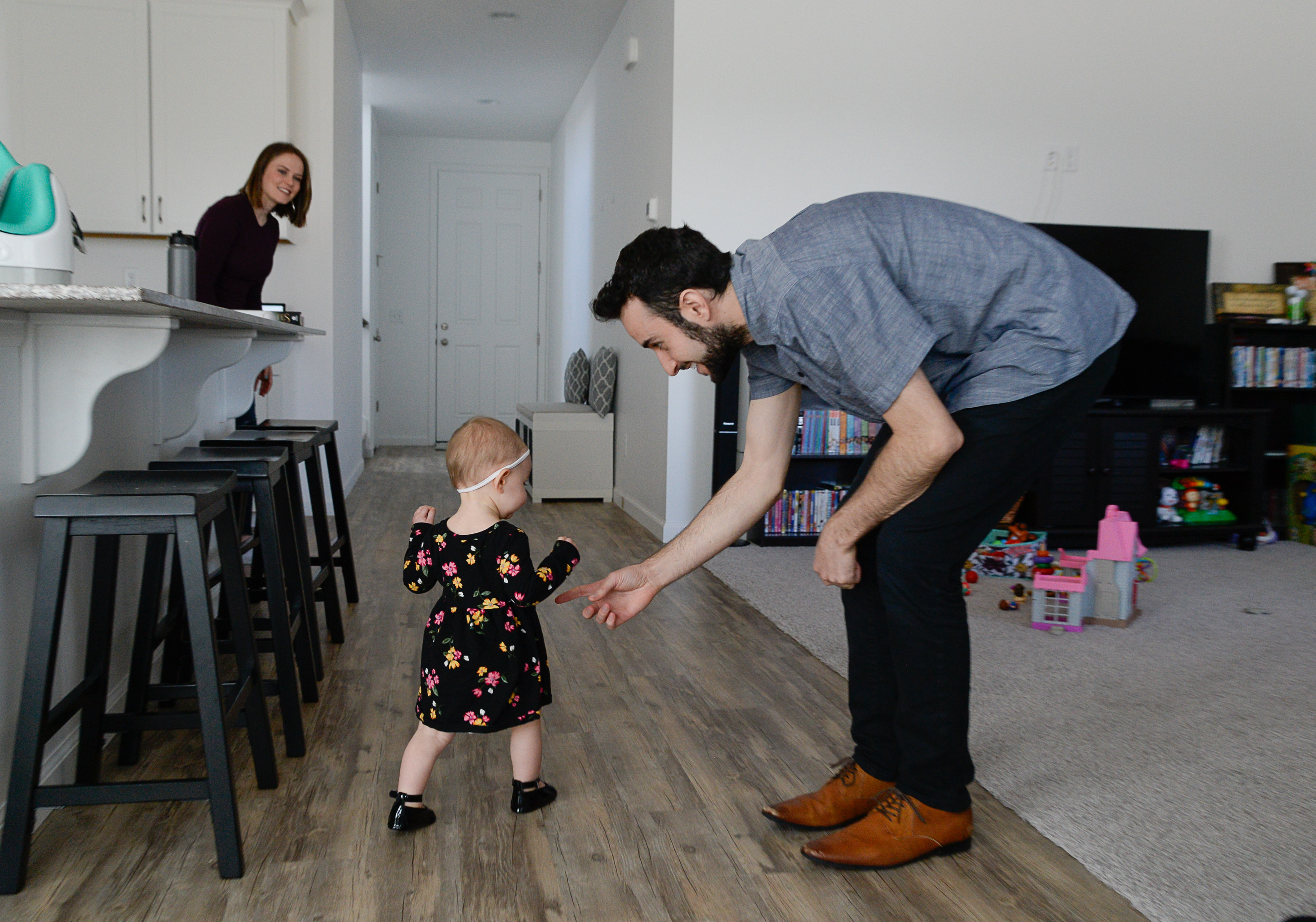 (Francisco Kjolseth | The Salt Lake Tribune) Jeremy and Ember Ulrich spend time with their daughter Jemma, 1, at their home in Lehi after moving from Pleasant Grove last October because they could get more house for their money there, and it's closer to Jeremy's job at Adobe in Lehi.