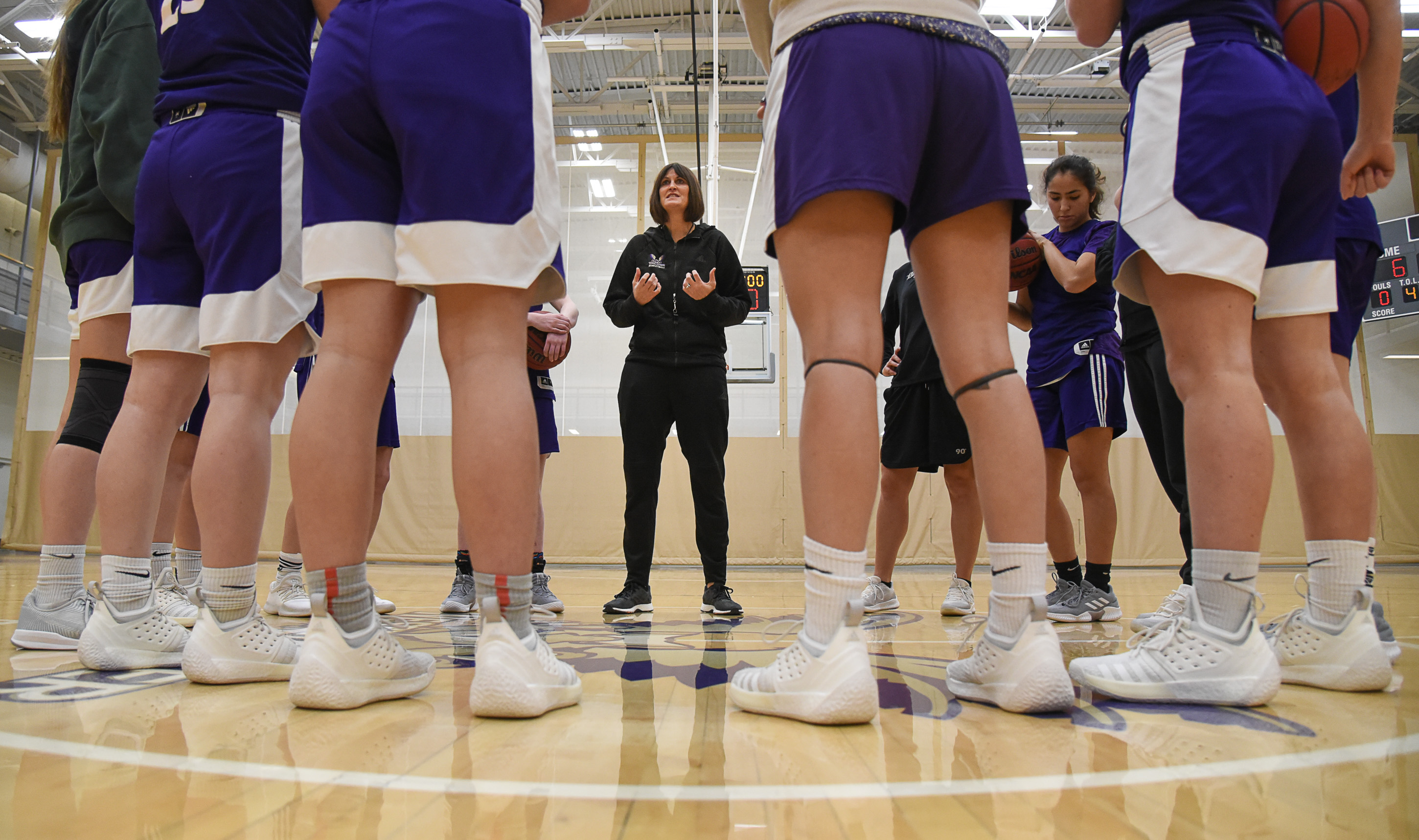 (Francisco Kjolseth | The Salt Lake Tribune) Westminster College women's basketball coach Shelley Jarrard, center, gathers her team before a practice in the Behnken Field House on Tuesday, Ja. 29, 2019. 