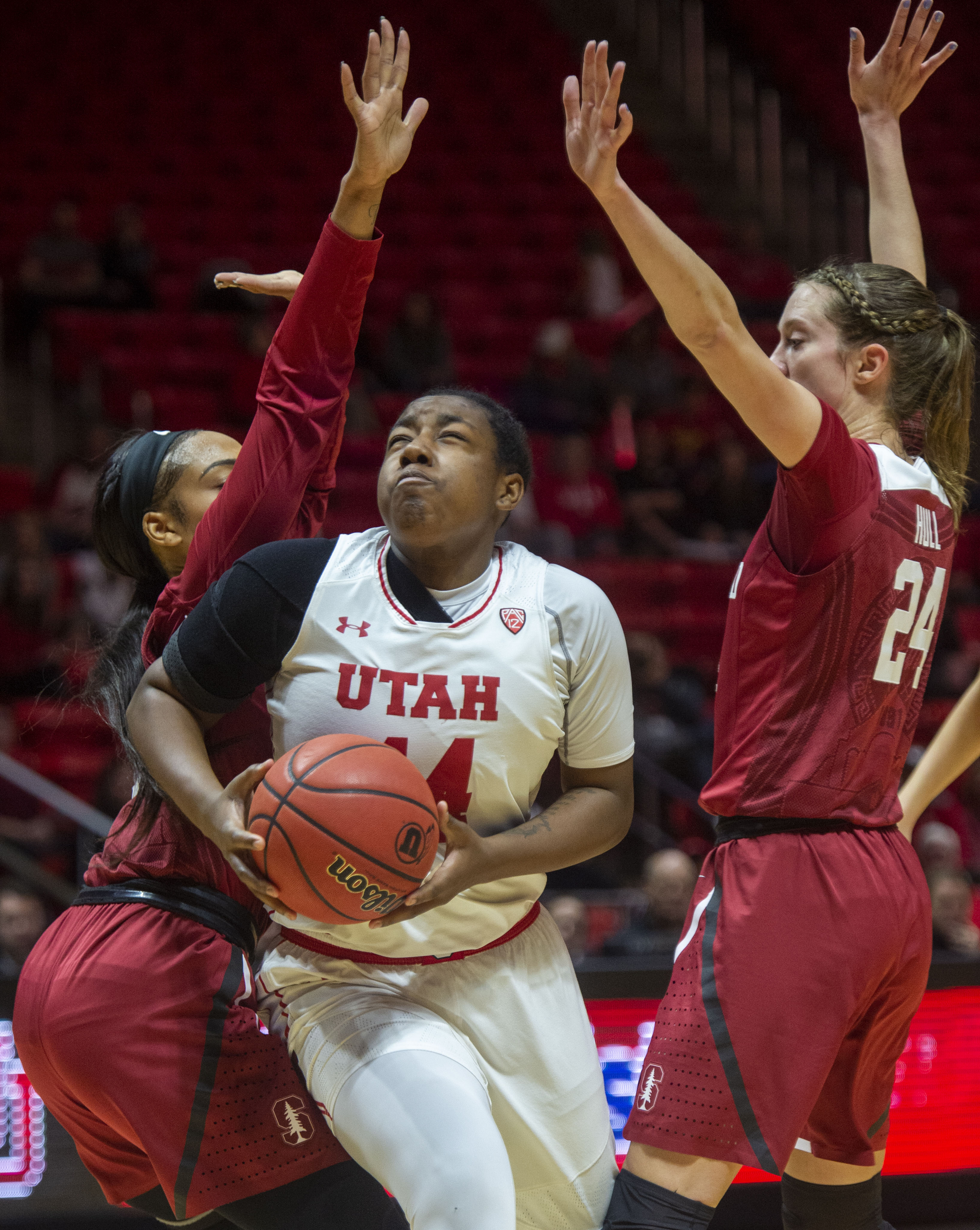(Rick Egan | The Salt Lake Tribune) Utah Utes guard/forward Dre'Una Edwards (44) splits defenders to get to the basket, in PAC-12 action between the Utah Utes and the Stanford Cardinals at the Jon M. Huntsman Center. Sunday, Jan. 27, 2019. 