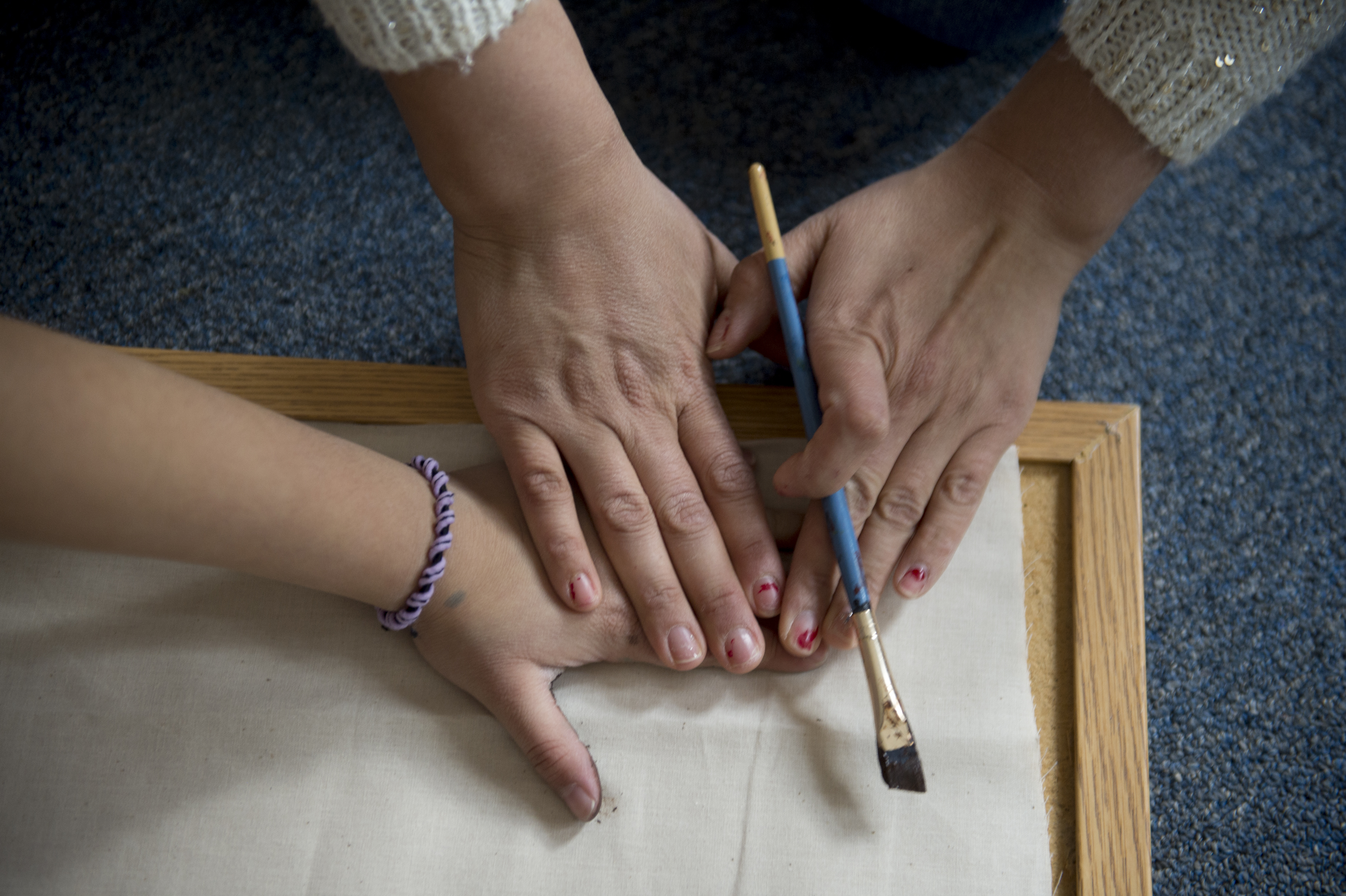 (Jeremy Harmon | The Salt Lake Tribune) Vicky Chavez worlds on a craft project with her 7-year-old daughter Yaretzi in their room at the First Unitarian Church on 1300 East in Salt Lake City on Dec. 14, 2018.