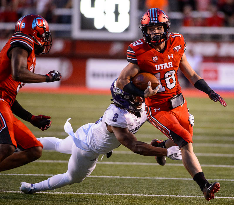 (Trent Nelson | The Salt Lake Tribune) Utah Utes wide receiver Britain Covey (18) makes a long, crazy run as the University of Utah Utes host the Weber State Wildcats, Thursday Aug. 30, 2018 at Rice-Eccles Stadium in Salt Lake City.