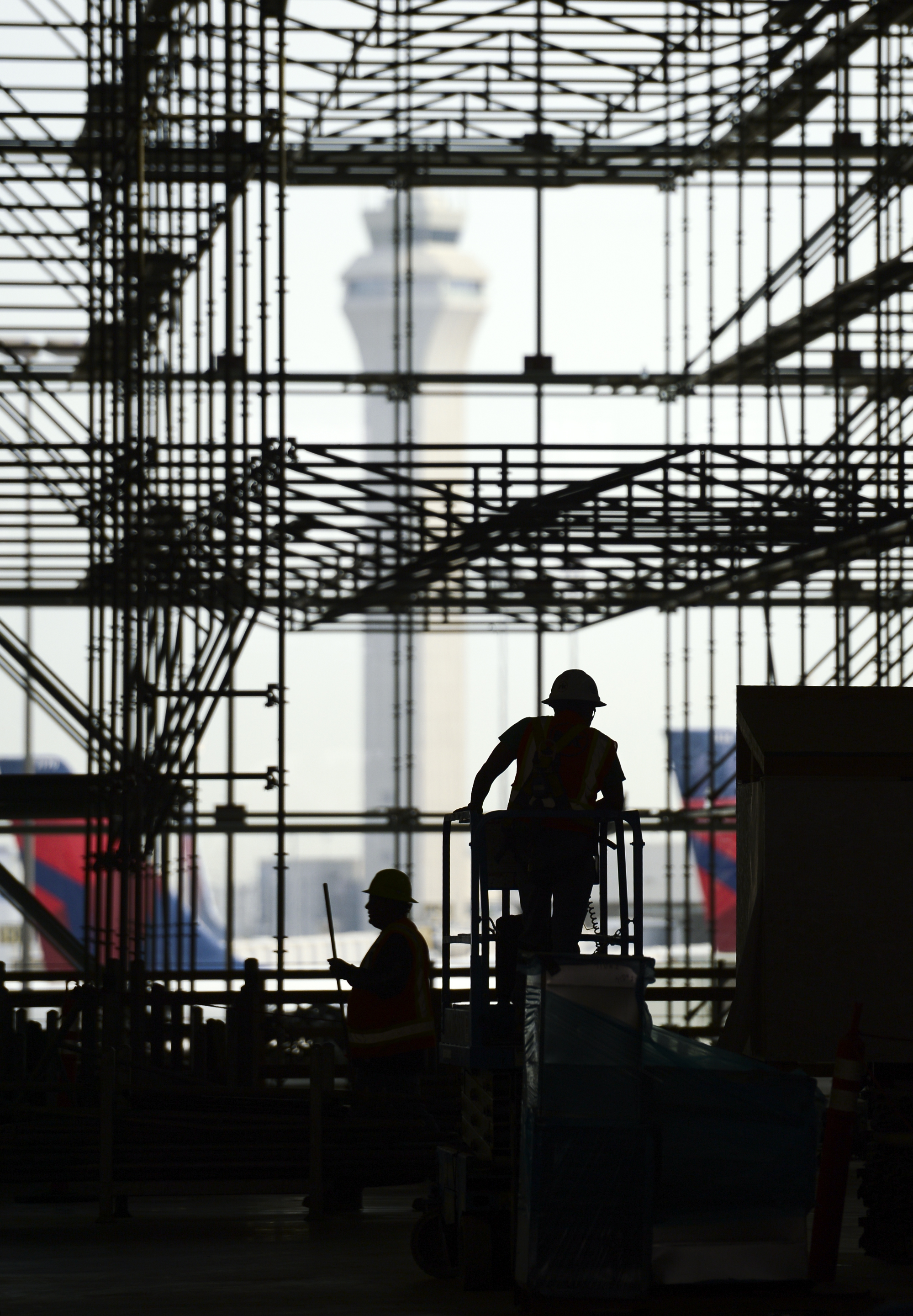 Leah Hogsten | The Salt Lake Tribune Salt Lake City International Airport's first phase construction of the $3.6 billion project is hitting the halfway mark Ñ and large new buildings and elevated roadways are more easily seen. Nearing completion is the new concourse for aircraft gates, an enclosed new terminal, the steel skeleton of a new ÒgatewayÓ building, a new five-story parking garage and elevated roadways. 