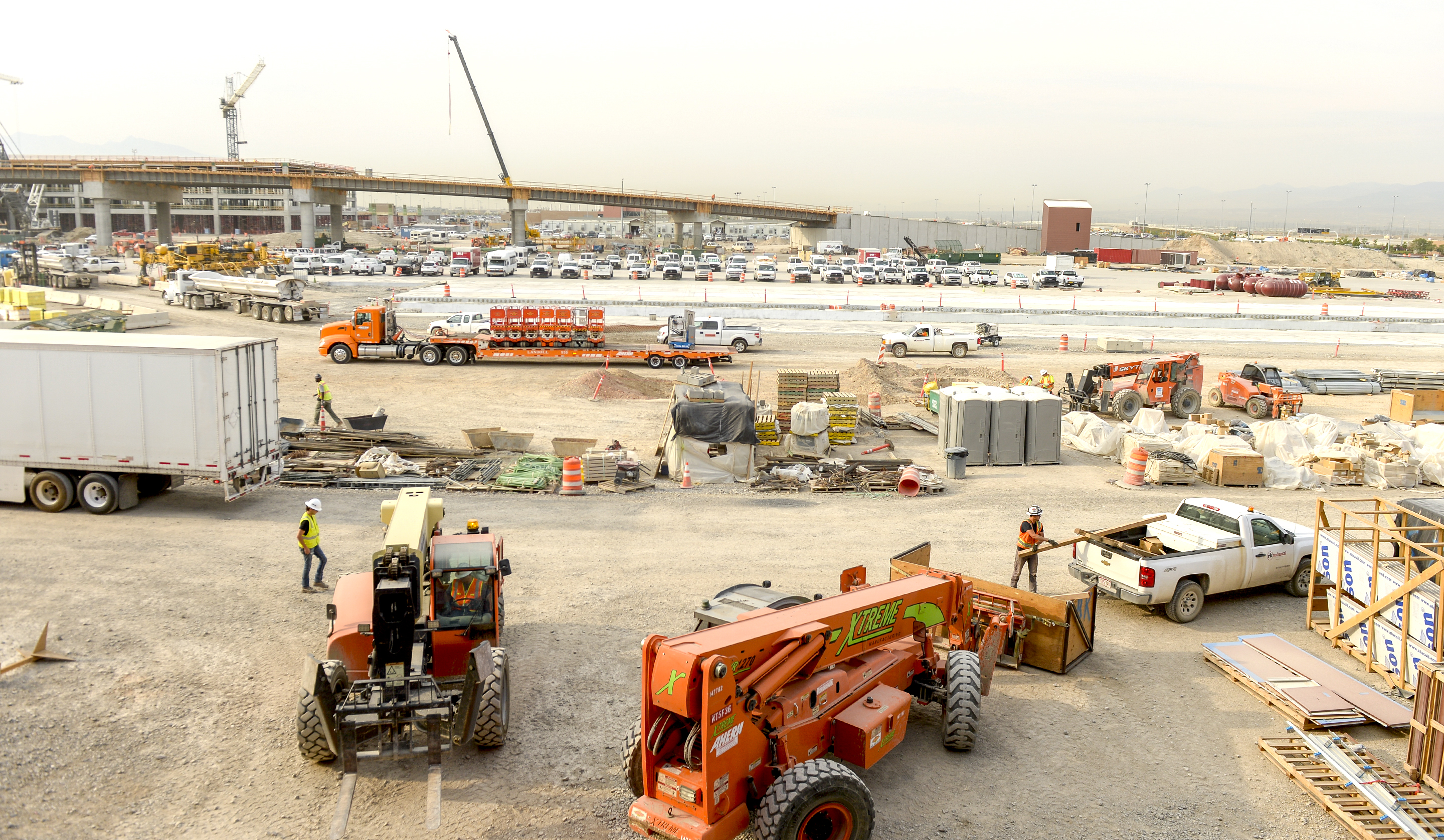 Leah Hogsten | The Salt Lake Tribune Salt Lake City International Airport's first phase construction of the $3.6 billion project is hitting the halfway mark Ñ and large new buildings and elevated roadways are more easily seen. Nearing completion is the new concourse for aircraft gates, an enclosed new terminal, the steel skeleton of a new ÒgatewayÓ building, a new five-story parking garage and elevated roadways. 