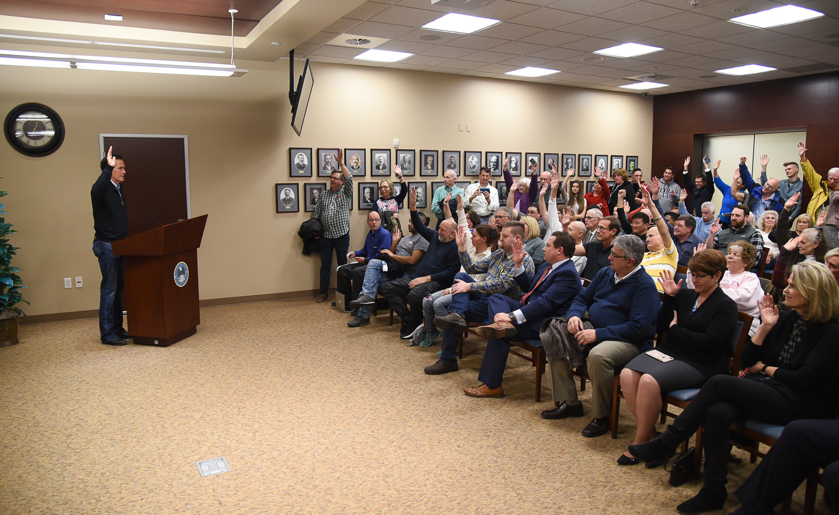 (Francisco Kjolseth | The Salt Lake Tribune) U.S. Senator Mitt Romney asks multiple questions including "who is upset the government is shut down" as he holds a town hall meeting at the Davis County administration building, Tuesday, January 22, 2019, to hear from local residents.