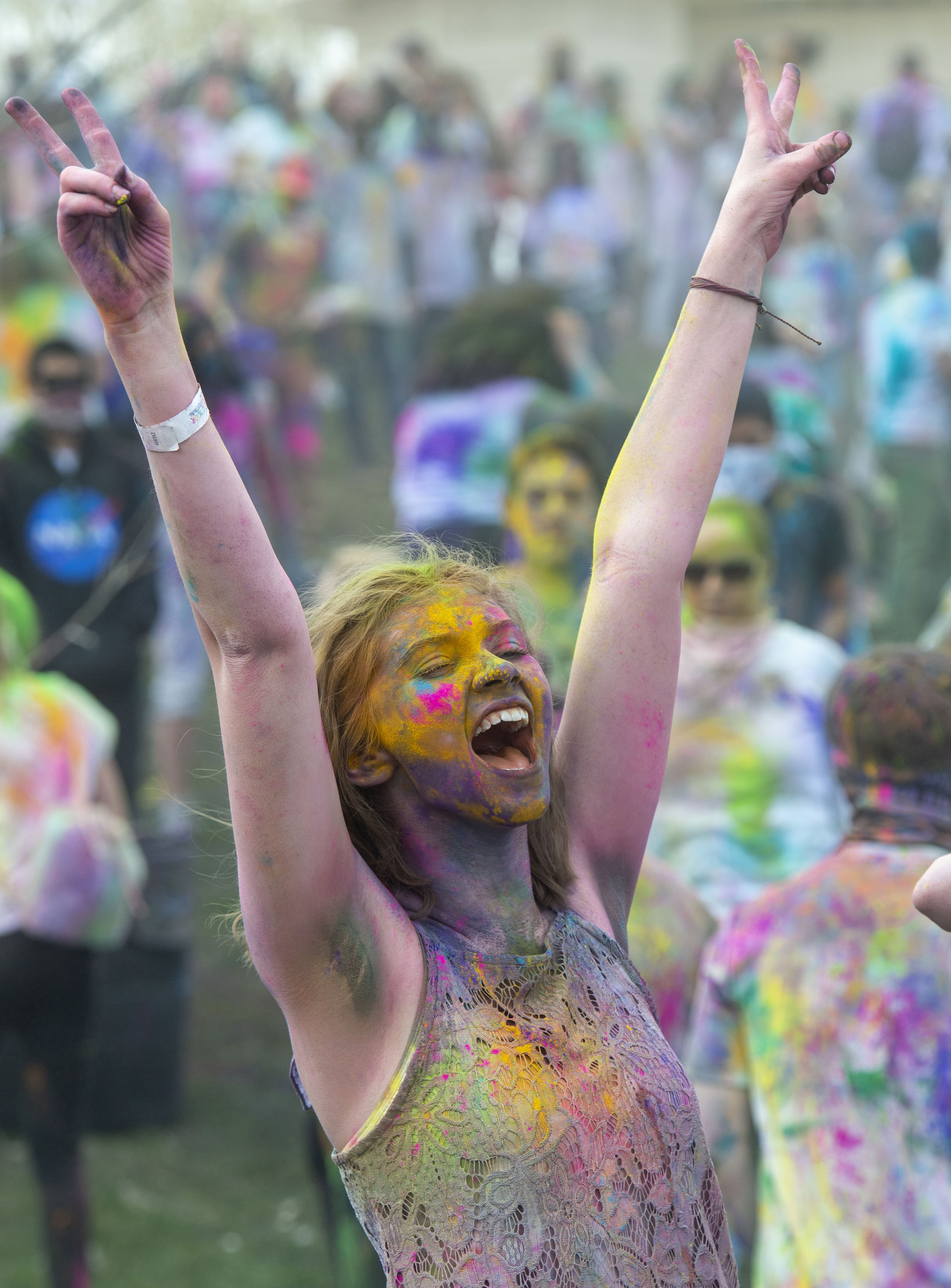 (Rick Egan | The Salt Lake Tribune) Adalaide Bailey, from Pocatello Idaho cheers along with the band, during the Holi Festival of Colors celebration at the Sri Sri Radha Krishna Temple in Spanish Fork, Saturday, March 30, 2019. 
