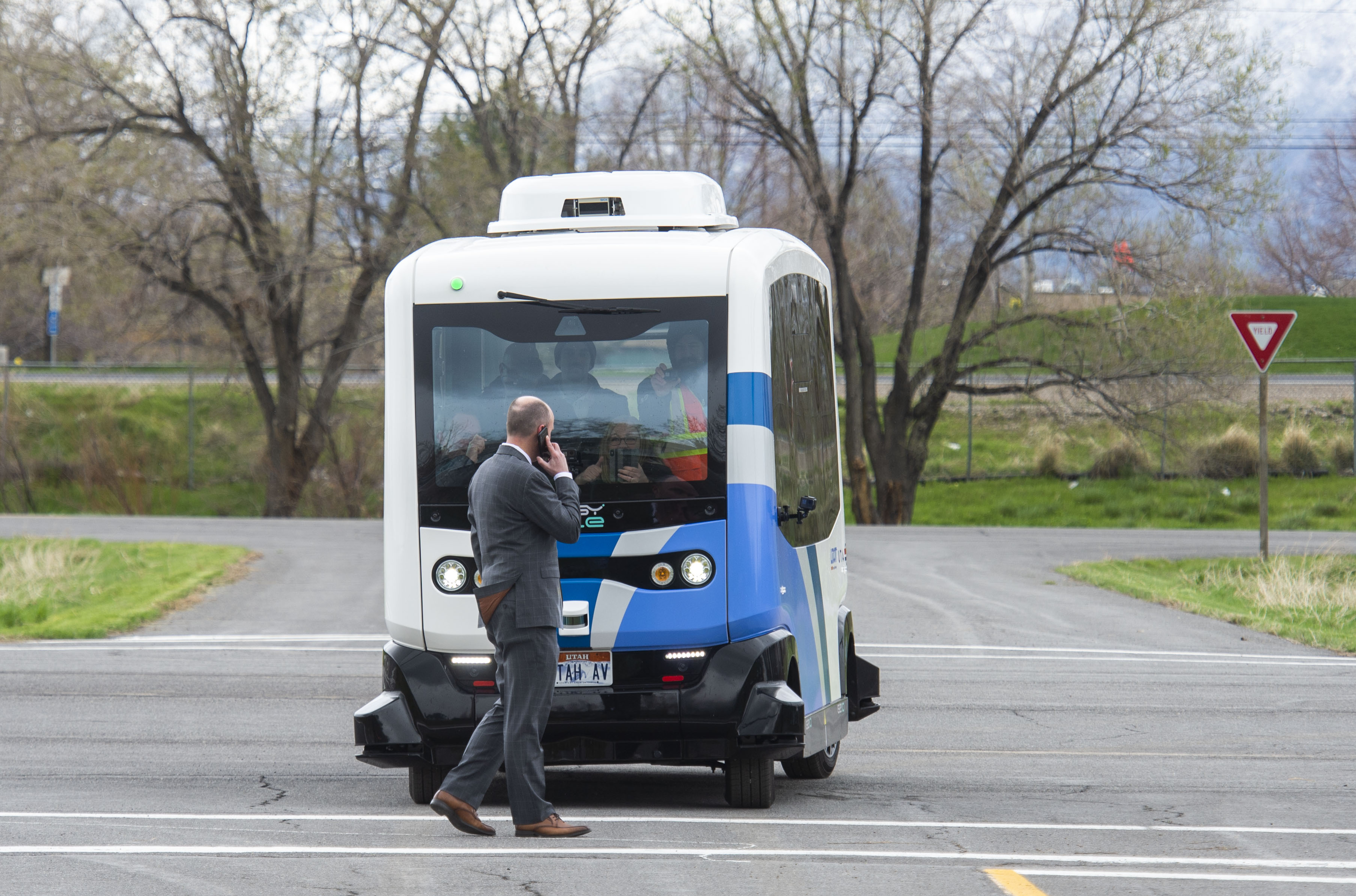 (Rick Egan | The Salt Lake Tribune) Lt. Governor Spencer J. Cox walks in front of an Autonomous Shuttle, to see if it will stop for him, during a demonstration as the Utah Department of Transportation, in partnership with the Utah Transit Authority, launched a new Autonomous Shuttle Pilot Project at the test track is across the street from UDOT headquarters on the west side of 2700 West. Thursday, April 11, 2019. 
