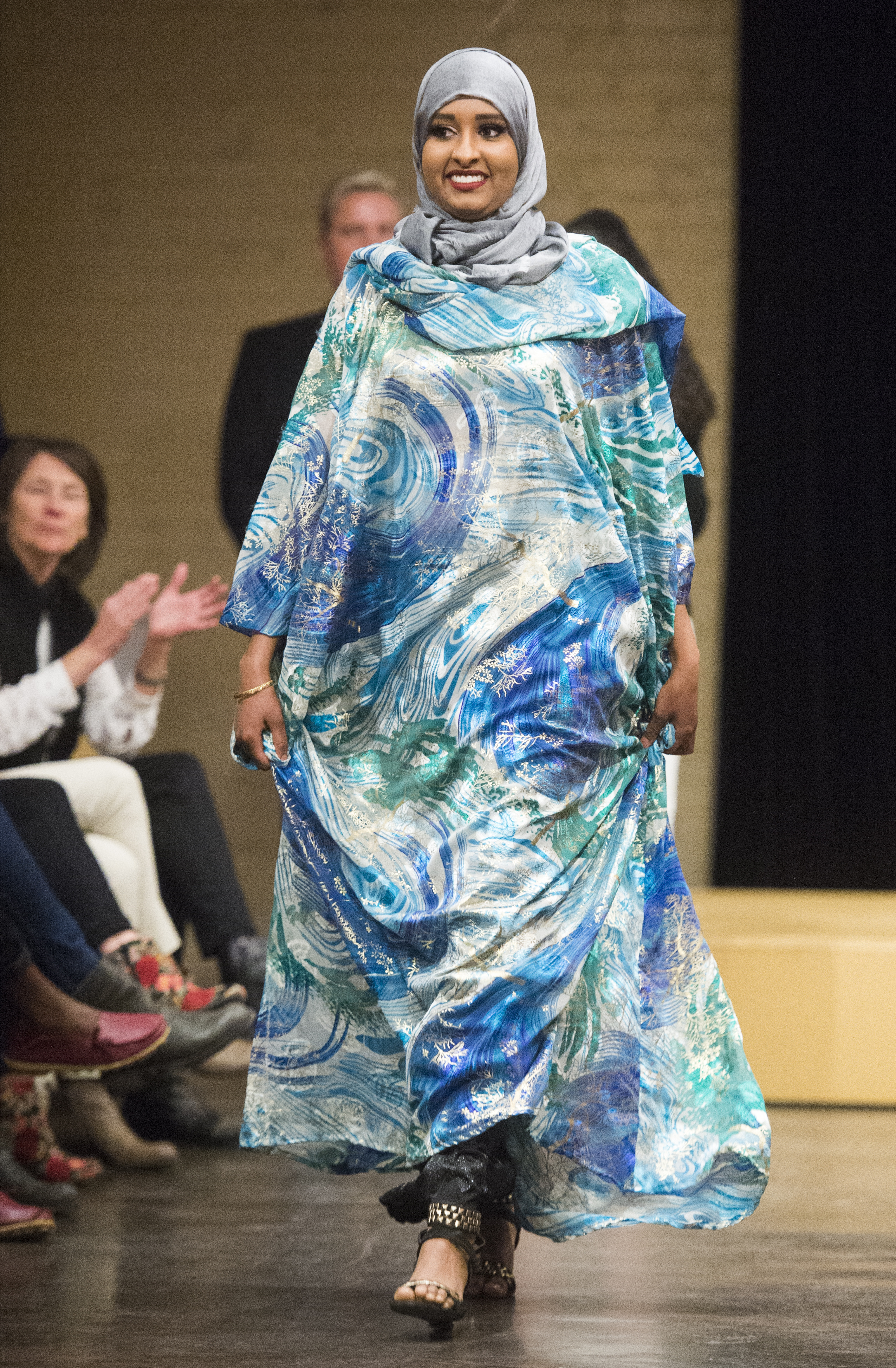 (Rick Egan | The Salt Lake Tribune) Halima Noor, models an outfit from Somalia at the 8th Annual Women of the World Fashion Show. The fashion show fund is raiser for the non-profit that seeks to help refugees settle in a new culture. Wednesday, March 7, 2018. 