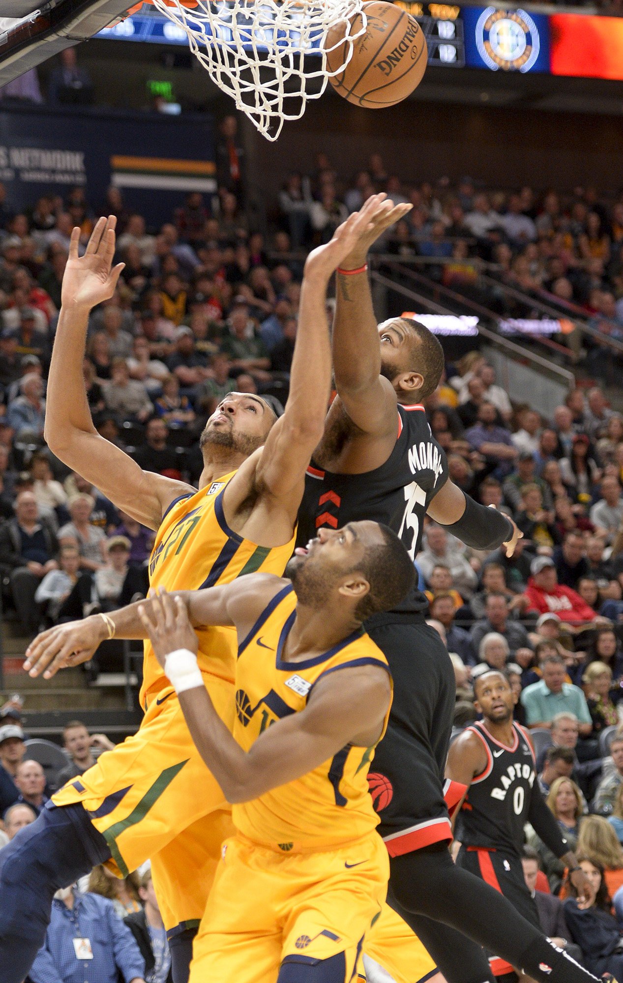 Leah Hogsten | The Salt Lake Tribune Utah Jazz center Rudy Gobert (27) battles Toronto Raptors center Greg Monroe (15) under the net as the Utah Jazz lose to the Toronto Raptors, 111-124, Monday, Nov. 5, 2018 at Vivant Smart Home Arena.