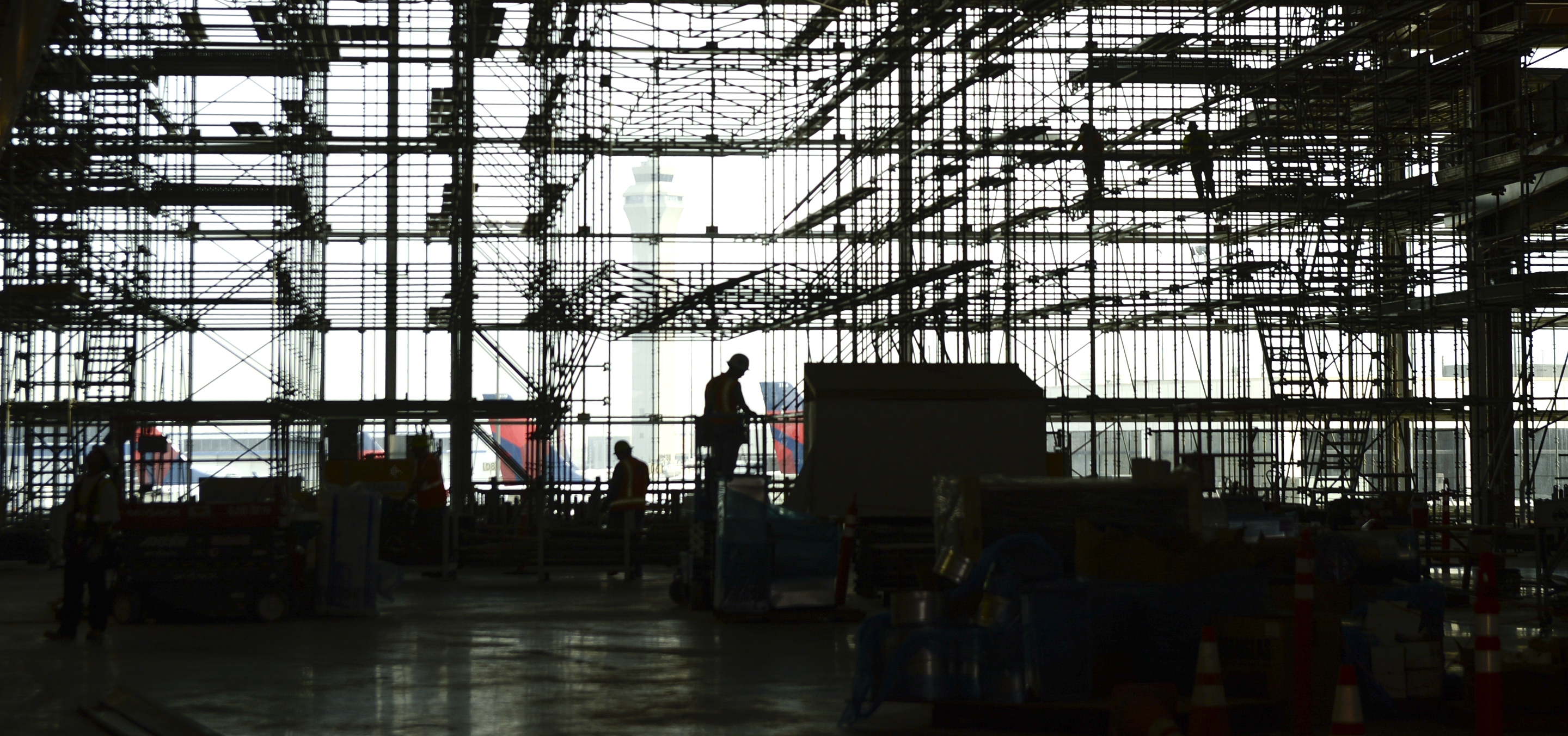 Leah Hogsten | The Salt Lake Tribune Salt Lake City International Airport's first phase construction of the $3.6 billion project is hitting the halfway mark Ñ and large new buildings and elevated roadways are more easily seen. Nearing completion is the new concourse for aircraft gates, an enclosed new terminal, the steel skeleton of a new ÒgatewayÓ building, a new five-story parking garage and elevated roadways. 